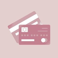 a pink credit card sitting on top of each other