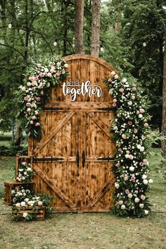 a wooden door with flowers on it and the words backyard wedding on an budget written in white