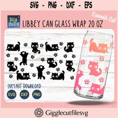 a glass with cats and paw prints on it is shown next to a pink background