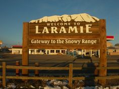 there is a sign that says welcome to larame gateway to the snowy range