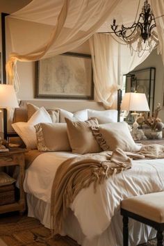 a bed with white sheets and pillows in a room