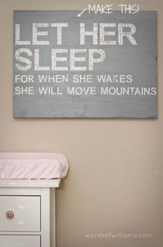 a baby crib with a sign above it that says let her sleep for when she wakes she will move mountains