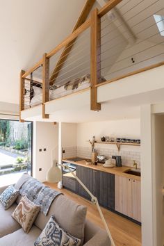 a living room filled with furniture next to a sliding glass door