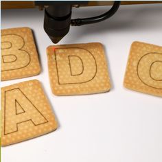 the letters are made out of cookies and placed on top of each other to spell out abc