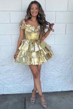 Experience the ultimate combination of elegance and fun in our Off the Shoulder Tiered Metallic Ruched Short Homecoming Dress. Featuring a stunning off-the-shoulder design, tiered and ruched detailing, and a touch of metallic shimmer, this dress is perfect for any homecoming event. Make a statement and turn heads with every step in this must-have dress.
Product Details


SKU: MD6200
Fabric：Metallic
Fully lined & Built with bra

Size: US 2-16. Check our Size Chart to get your correct size. 
Free custom size service is available. You can email me your specific size, before or after your order. Or add your measurements to the note box when you check out.


Feel free to contact our customer service: contact@modsele.com if you have any questions. Gold Ruffled Dress For Holiday, Gold Ruffled Holiday Dress, Holiday Gold Ruffled Dress, Party Off Shoulder Dress With Ruffle Hem, Glamorous Gold Dresses With Ruffles, Glamorous Gold Dress With Ruffles, Ruffled Off-shoulder Dress For Prom Season, Gold Ruffled Dress For Party Season, Fitted Off Shoulder Dress With Ruffle Hem For Party