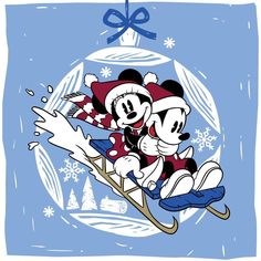 mickey and minnie on sled in front of christmas ornament with snowflakes