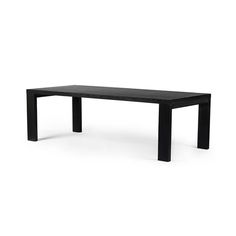 a black table sitting on top of a white floor