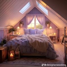 a bed sitting under a window in a bedroom next to a table with candles on it