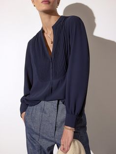 Our Lora Blouse, in a easy popover silhouette, features a romantic front pintuck detail, a collarless button placket, and double shoulder pleats. Tan Pants, Navy Blouse, Navy Dress, Work Blouse, Cuff Earrings, Pin Tucks, A Romantic, Dressed Down, Button Placket