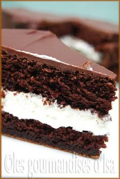 a piece of chocolate cake with white frosting