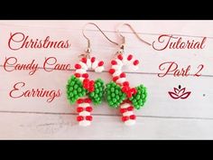 christmas candy cane earrings are shown on a white background with red, green and white beads