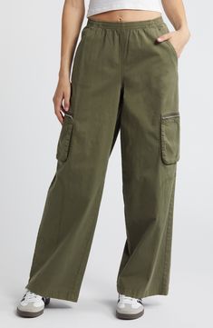 Get to work(wear) in these utility-essential cargo pants boasting a baggy wide-leg silhouette and stretchy pull-on waistband. 31" inseam, 26" leg opening; 13" front rise; 15 1/2" back rise (size Medium) Elastic waist Front slant pockets; back snap-flap pockets; cargo bellows pockets 98% cotton, 2% spandex Machine wash, tumble dry Imported Relaxed Fit Wide-leg Utility Cargo Pants, Khaki Utility Cargo Jeans With Elastic Waistband, Utility Style High-waisted Wide Leg Pants With Multiple Pockets, Khaki Wide Leg Utility Pants, Wide Leg Parachute Pants With Multiple Pockets For Work, Utility High-waisted Wide Leg Pants With Cargo Pockets, Fall Utility Wide Leg Cargo Pants, Khaki Utility Wide Leg Pants With Side Pockets, Utility Wide Leg High-waisted Pants With Side Pockets