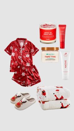 the contents of a woman's holiday gift set including slippers, hand cream and body lotion