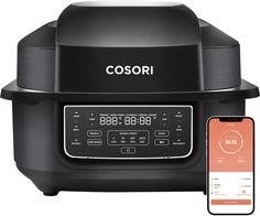 an appliance with a cell phone next to it and the word cosori on