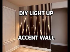 an empty room with the words diy light up accent wall