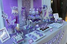 purple and silver dessert table at a birthday party