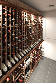 a wine cellar filled with lots of bottles