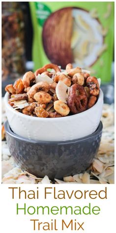 a bowl filled with nuts sitting on top of a table