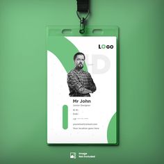 a green id card with a man's face on it and a black lanyard