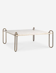 a coffee table with two metal legs and a white marble top, on a grey background