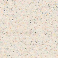 a white background with multicolored speckles