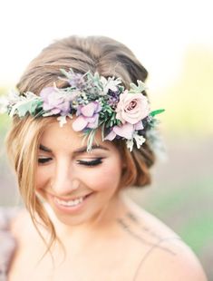 a woman with a flower crown on her head