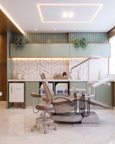 a dentist chair sitting in the middle of a room next to a sink and counter