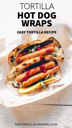 tortilla hot dog wraps with ketchup and relish on them in a basket