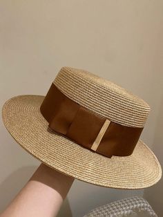 She'll be making a classy statement at the beach with this gorgeous ribbon boater hat. Decorated with a satin ribbon with a goldtone trim, it has just the right amount of sophistication to make her summer outfits look extra chic and totally Insta-ready! Versatile look makes it super easy to dress up or dress down, depe British Hats, Vintage Straw Hat, Flat Top Hat, Womens Beach Hat, Womens Straw Hats, Neutral Clothing, Modesty Outfits, British Women, Soft Hats