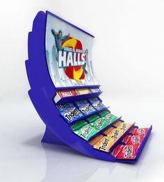 a display case filled with lots of candy bar flavors on top of each other in front of a white background