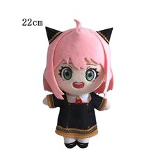 a stuffed animal doll with pink hair and green eyes, wearing a black cat outfit