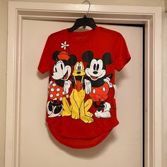 Women’s Small Red Playful Red Character Print T-shirt, Playful Red T-shirt With Cartoon Print, Playful Red Cartoon Print T-shirt, Casual Tops For Disney Trips, Fun Mickey Mouse Tops For Disney Trips, Fun Mickey Mouse Top For Disney Trips, Playful Red T-shirt With Character Print, Fun Short Sleeve Tops For Disney Trips, Playful Red Mickey Mouse Top