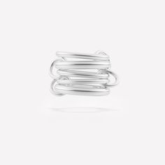 Another take on our original best seller. The Vela Deux Silver features 5 orbiting bands of .925 sterling silver with .925 sterling silver connectors. This style features a slightly lower profile than our original Vela ring with 2.8mm, 2.3mm and 1.7mm gauge bands. 20% of the proceeds from this ring will be donated to Common Cause. Bands: .925 sterling silver 2.3mm gauge .925 sterling silver band 2.8mm gauge .925 sterling silver band 2.3mm gauge .925 sterling silver band 1.7mm gauge .925 sterling Linked Rings, Galaxy Ring, Luxury Jewelry Brands, Shimmer Shine, Luxury Rings, Stacked Jewelry, Sterling Silver Bands, Everyday Jewelry, Jewelry Rings Engagement