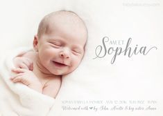 a smiling baby wrapped in a blanket with the words meet sophiia on it