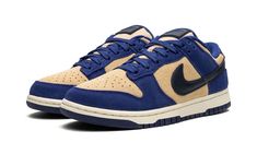 The Women’s Nike Dunk Low “Blue Suede” is a women’s-exclusive colorway of the popular sneaker with a unique arrangement of materials.  The “Blue Suede” Dunk Low features a full-suede construction with tan-colored suede appearing on the perforated toe, mid-panel, and collar, and blue suede on the overlays.  A black leather Swoosh is found on the sides.  A Deep Royal Blue “Nike” logo is embroidered on the heel and printed on the raised black leather tongue patch.  A Sail rubber midsole and blue De Dunks Outfit, Tan Sneakers, Dunk Low Nike, Deep Royal Blue, Blue Suede Shoes, Popular Sneakers, Stadium Goods, Blue Nike, Suede Material