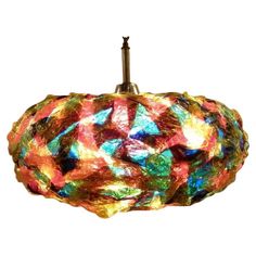 a multicolored light hanging from the ceiling