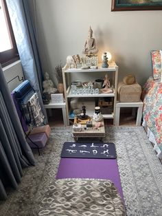 a living room filled with lots of furniture and decor on top of carpeted flooring