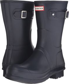 PRICES MAY VARY. The Men's Original Short Rain Boot is a shorter version of the iconic Hunter Original Tall Boot and perfect for wet-weather conditions. Formed of natural rubber, each boot is handcrafted and assembled over three days before being vulcanised for superior protection. The Hunter Original tread pattern and comfortable 100% recycled polyester lining completes the design on this 100% waterproof boot. Pull on Closure 11" Shaft Height 1" Heel Height 100% Vegan Mens Wellies, Short Rain Boot, Hunter Short, Festival Boots, Short Rain Boots, Wellington Boot, Wellington Boots, Tall Boot, Women Hunters