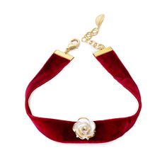 We love giving classic elements a modern makeover for the new season. This choker is finished with a golden porcelain rose and velvet ribbon with a gold-plated extension chain. The rose is hand-painted with gold lustre and decorated with five small sparkling Cubic Zirconia stones. The choker perfectly compliments an off-the-shoulder top or stunning evening dress. Black Velvet and Navy Velvet options are also available.Material:Handmade porcelain roseRed velvetGold plated brassCubic Zirconia Gold Soap Perfume, Evening Dress Black, Chemical Products, Porcelain Roses, Handmade Porcelain, Navy Velvet, Velvet Choker, Porcelain Jewelry, White Cloud