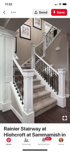 the stairs in this house are white with black railings and balconies on each side