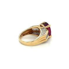 GIA Certified Oval Brilliant 7 Carat Purplish Red Tourmaline Ring, set in 18K Two Tone Gold. Adorned with 26 Round Cut Diamond Side Stones, Totaling 1.35 carats.  The center stone has a rich deep color saturation and minimal/none inclusions to the naked eye. Set in a 4-prong 18k solid gold mounting with a wide frame that contrasts the long oval cut dimensions of the center stone. `  GIA Item Description: Center stone set in yellow and white metal ring with numerous near-colorless round brilliant Red Diamond Oval Cabochon Ring, Formal Ruby Ring With Oval Cabochon Center Stone, Formal Ruby Ring With Oval Cabochon, Fine Jewelry Oval Birthstone Ring, Formal Ruby Ring With Gemstone Accents, Formal Ruby Ring With Oval Cabochon And Accent Stones, Luxury Oval Ruby Ring With Accent Stones, Classic Ruby Ring With Gemstone Accents For Formal Occasions, Luxury Oval Ruby Ring For Formal Occasions