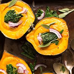 three squash halves with spinach, onions and cheese