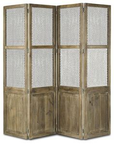 an old wooden room divider with metal meshwork on the sides and bottom panels