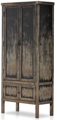 an old wooden armoire with two doors