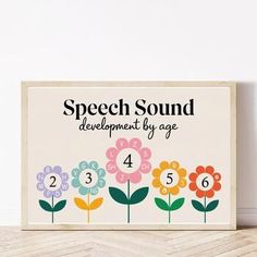 a wooden sign that says speech sound development by age with flowers on the front and side