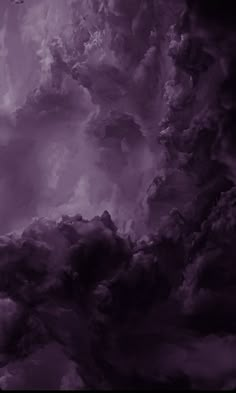 the sky is filled with purple clouds