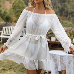 Step into summer with elegance and style with our Chic Net Yarn Tassel Beach Dress Cover-Up. Perfect for the fashion-forward woman, this cover-up combines comfort, style, and functionality, making it an essential for any beach day or poolside relaxation. Key Features Material: Crafted from high-quality acrylic, ensuring a lightweight and breathable feel. Pattern: Elegant solid design that offers a chic and timeless look. Style: Designed in an 'Office Lady' elegant fashion style, this cover-up is Beachy Mini Length Cover-up For Beach Party, Beachy Mini Sundress For Beach Cover-up, Beachy Sundress For Spring Beach Cover-up, Spring Mini Length Cover-up For Day Out, Spring Day Out Mini Length Cover-up, Chic Mini Length Cover-up For Vacation, Beach Season Dresses With Back Tassel Tie-up, Summer Mini Dress For Poolside, Spring Beach Cover-up In Breezy Style