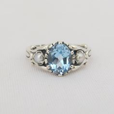 Sterling Silver Oval Aquamarine & Seed Pearl Ring...Marked 925...Total of weights 3.6grams... Size 10...Measure of stone center 8.5 x 6.5MM...It's in very good condition. Seed Pearl Ring, Aquamarine Engagement Ring, Seed Pearl, Pearl Ring, Sterling Silber, Ring Verlobung, Aquamarine, Piercings, Engagement Ring