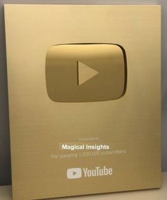 a gold box with a play button on the front that says,'magiclights for passing 1, 000 subs '