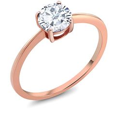 a rose gold engagement ring with an oval cut diamond